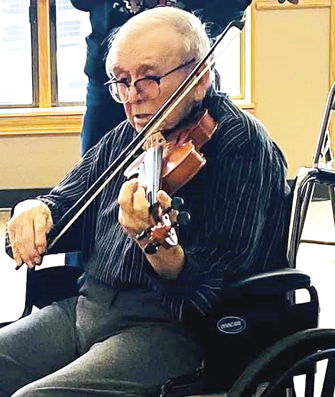 Arnold Johnson,
still playing violin at age 101