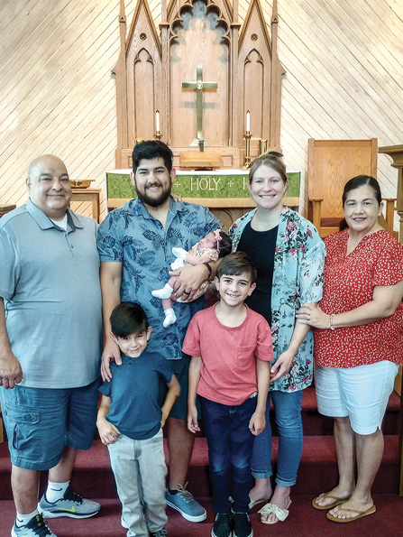 The Arguelles family at the baptism of their daughter