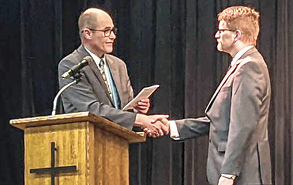 Regents chairman Pastor John Hein (l) and new professor Matthew Thurow (r)