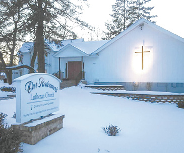 A church sign is covered in snow, indicating a recent snowfall.

AI generated content